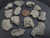 13-piece Trinitite lot - 30 grams size comparison to copper penny top side