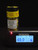 25 Grams of Autunite Fragments in a Glass Vial under normal light measured by the radiacode 102