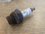 showing what the polonium-210-spark-plug-firestone-size-m-20 looks like opened after 70 years