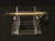 Glowbody Minnow on display stand under indoor light