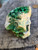 Green flaky Torbernite on Matrix under outdoor light