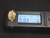 tan Gadolinite-(y)  crystal measured with the Radiacode 103