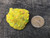 15 Gram yellow-green autunite crystal formation under outdoor light size comparison to copper penny top view