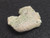 vitreous looking trinitite 5.3 gram specimen under indoor light