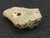 This vitreous looking 4.1 gram trinitite specimen under indoor light