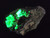 Bright yellow/green autunite crystals on dark matrix demonstrating fluorescence under 365n m light