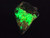 bright fluorescent green autunite on black quartz matrix under 365nm