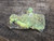 bright  yellowish Andersonite, Schröckingerite, Metamunirite on a sandstone matrix under outdoor light rotated 90 degrees