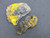 pair of specimens showing bright yellow Bayleyite on Matrix under outdoor light