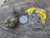 pair of specimens showing bright yellow Bayleyite on Matrix under outdoor light size comparison top copper penny top view