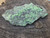 bright green Andersonite & dark green Schröckingerite on Sandstone under outdoor light