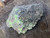 Bright yellow Andersonite & Schröckingerite on grainy Sandstone matrix under outdoor light