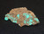 bright blue Andersonite & Schröckingerite on grainy Sandstone under  365nm UV light