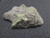 Drab yellow Andersonite & Schröckingerite, and white Metamunirite on sandstone matrix under 365nm indoor light