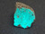 Bright blue Schröckingerite & Andersonite in grainy sandstone matrix under indoor and 365nm UV light