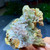 water clear hyalite opal with quartz crystal formation under outdoor light