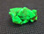 bright green gnarly Autunite crystal formation under outdoor light and 365nm light