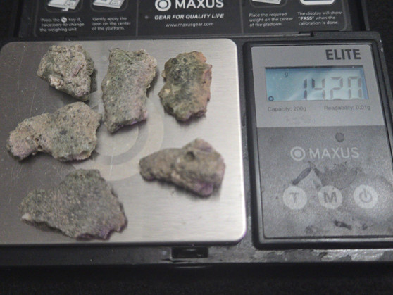 Trinitite lot 14 Grams, 6 Pieces  on scale 14.2 Grams