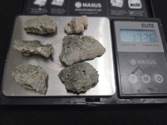 Trinitite lot 17 Grams, 6 Pieces on scale - 17.36 Grams