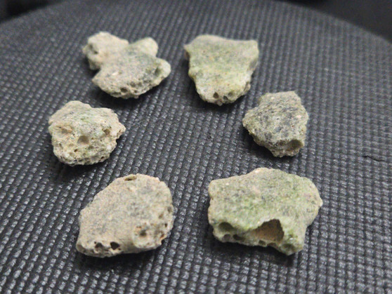 Trinitite lot 12 Grams, 6 Pieces on scale - 12.7 grams
