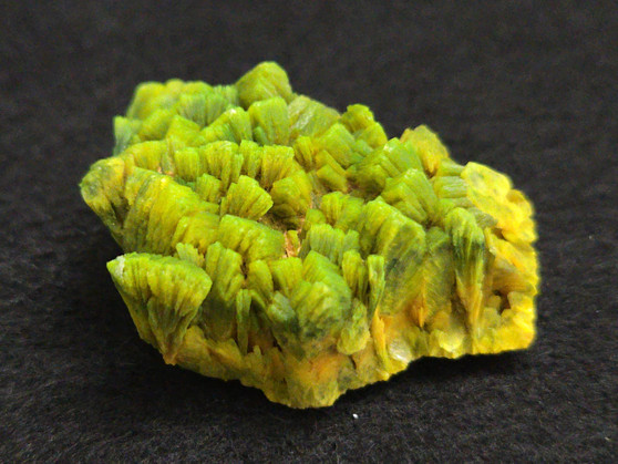 26.7  Gram Lamellar Autunite Crystal under indoor light -
