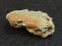 2.7 Gram Trinitite (Atomic Bomb Glass) specimen with red tinge under indoor light