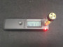 2 Grams Autunite Fragments in a Sealed Via being measured by the Radiacode 102 -  16.9kCPM
