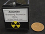 bottom view of appropriately labeled perky box showing label and trefoil warning label