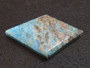 carved and polished Blue Apatite Crystal  under indoor light