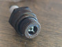 showing what the polonium-210-spark-plug-firestone-size-m-20 looks like opened after 70 years
