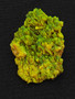 Lamellar Autunite Crystal - Fluorescent Uranium Ore, 25 Grams under indoor light