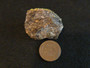 Autunite on Matrix Mini-Cabinet Specimen ~ Fluorescent Uranium Ore under indoor light size comparison with copper penny - bottom view