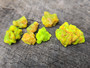 7 Piece Autunite Lot under outdoor light demonstrating daytime fluorescence