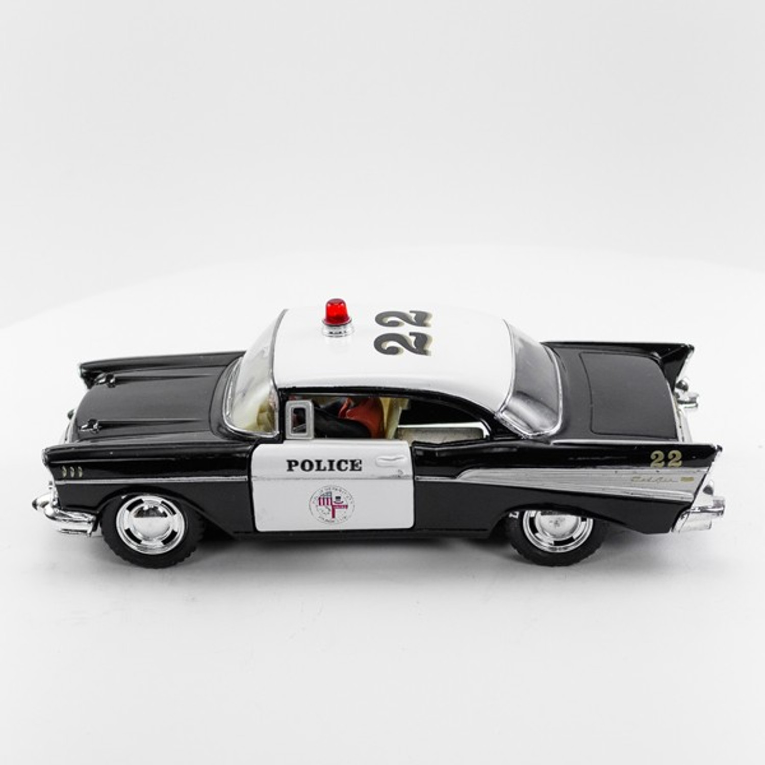 Stock Number 16173: Black Police Car 57 Chev by SCX
