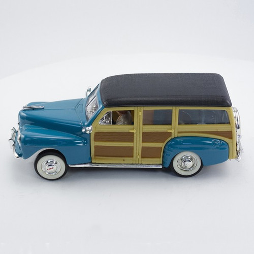 Stock Number: 16151 Teal Diecast Woody Wagon with Carrera Chassis