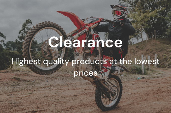 Man riding dirtbike with clearance text