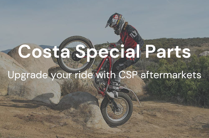 Man riding dirtbike in air with costa special parts text