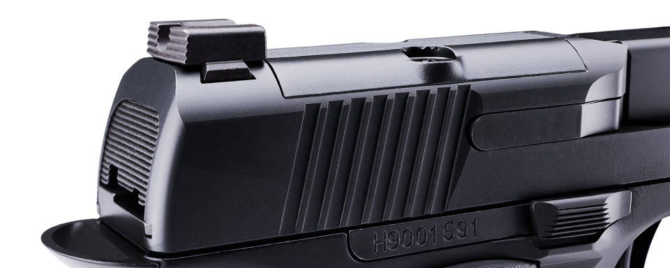 Angled close-up of Daniel H9 slide and rear night sight – featuring serrations and optics-ready cut