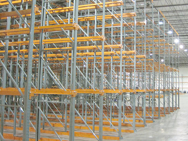 Large drive-in pallet racking system in warehouse