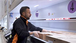 Employee picks boxes from Modula VLM