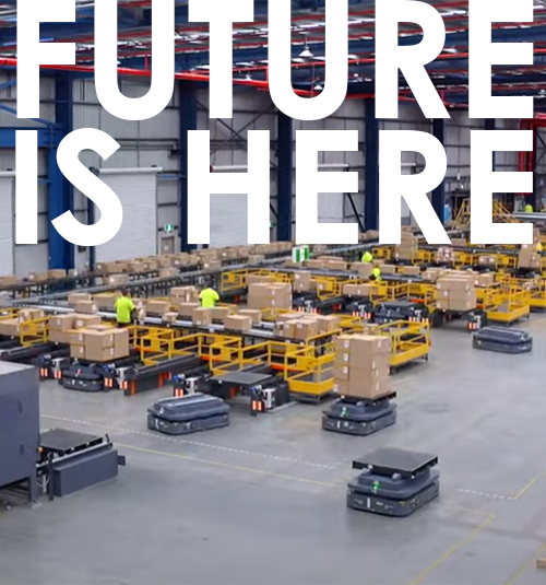 AMR robots work in a warehouse, the words future is here appear at top of image