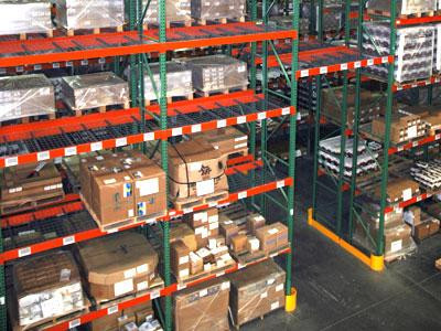 Tall selective pallet racking with pallets on the storage levels