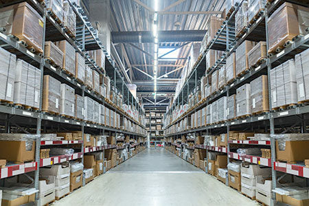 Warehouse racking with a wide aisle.