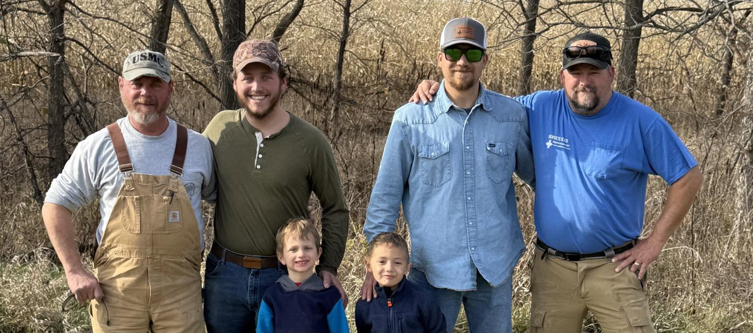 The Double D Hunting families together in a Missouri field, from granddads to grandkids
