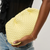 Tate Woven Frame Clutch in Butter