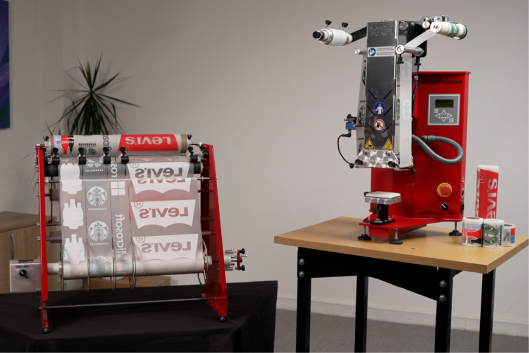 InnoPrinter DTF slitter and MK1 semi-automatic heat press workflow from printed transfer roll to finished product