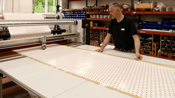 ZFP wide format laminator in roll-to-sheet mode cutting the laminated web into sheets to registration marks or set length