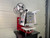 InnoPrinter MK4 roll-to-roll semi-automatic heat press with large transfer reel loaded and full-size platen for oversized graphics