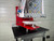 Side view of the InnoPrinter MK4 roll-to-roll heat press with the full-size platen installed for back prints, totes, and panels