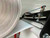 Loaded transfer roll feeding into the InnoPrinter MK4 roll-to-roll heat press, keeping oversized transfers in continuous roll format